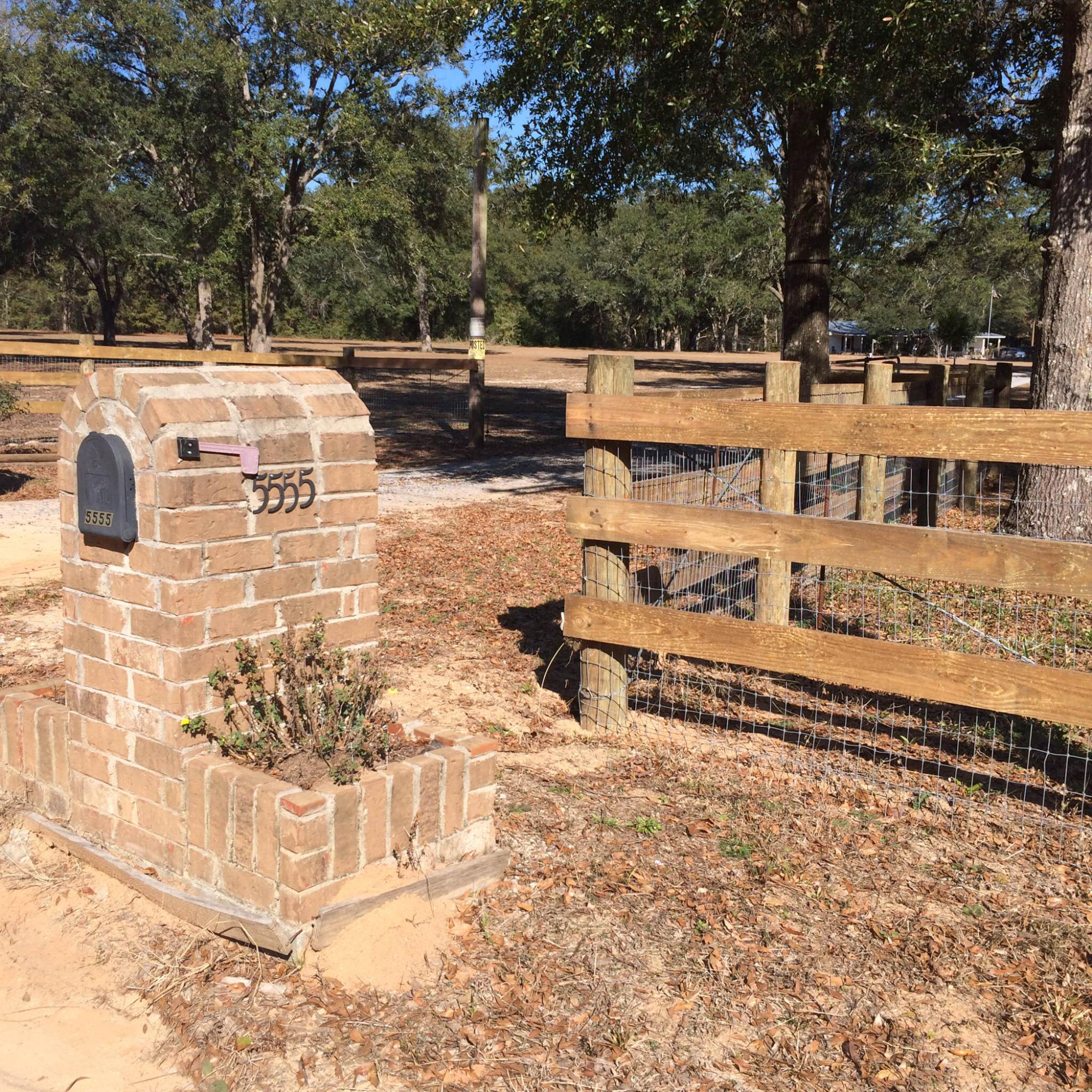 5555 Buck Ward Road Baker, FL 32531 - Photo 68 of 68 a view of a yard with wooden fence