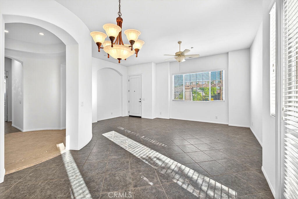 41 Vista Mirage Way Rancho Mirage, CA 92270 - Photo 5 of 25 en view interior in hallway with a chandelier