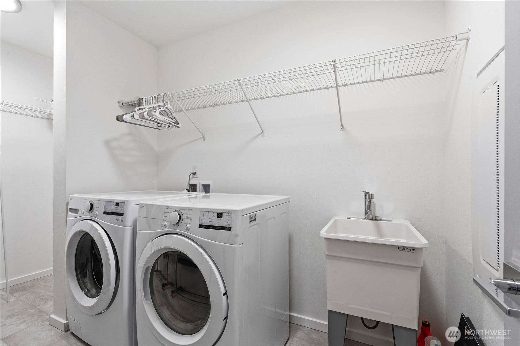 6563 Southeast 8th Street Renton, WA 98059 - Photo 29 of 40 a utility room with dryer and washer