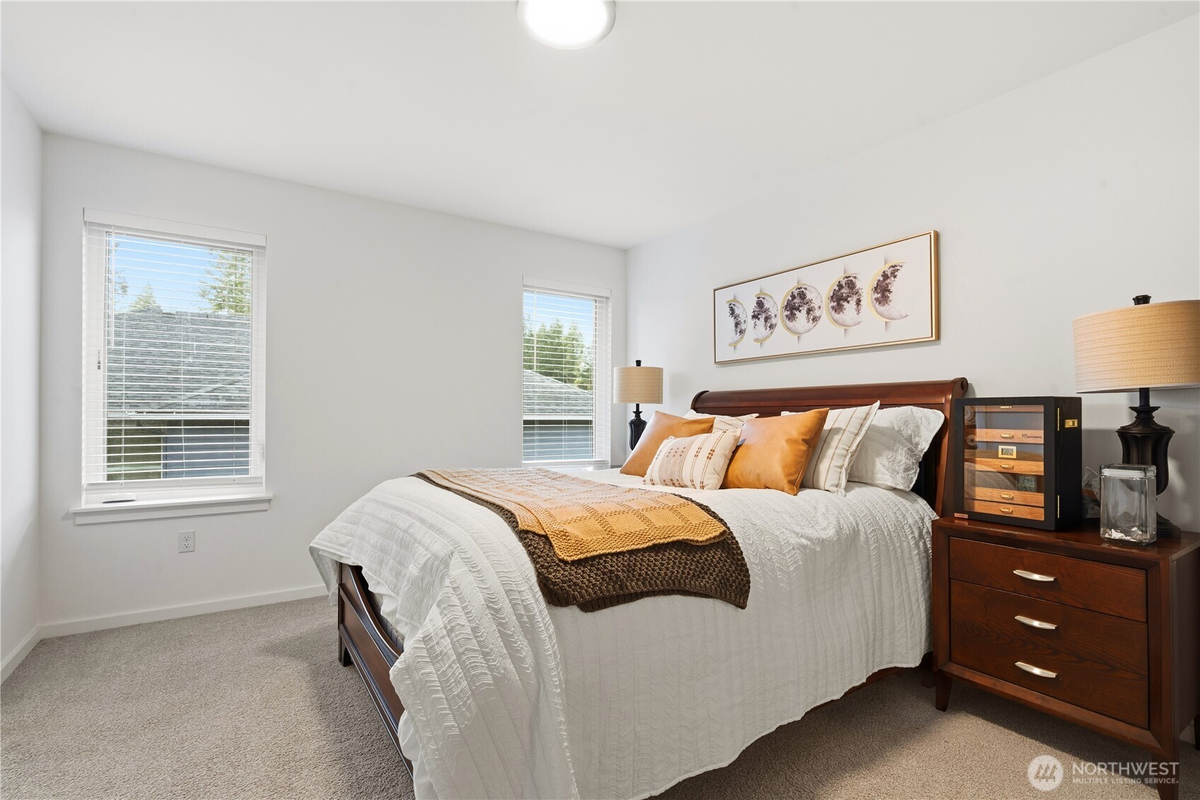 6563 Southeast 8th Street Renton, WA 98059 - Photo 30 of 40 a bedroom with a bed and a night stand