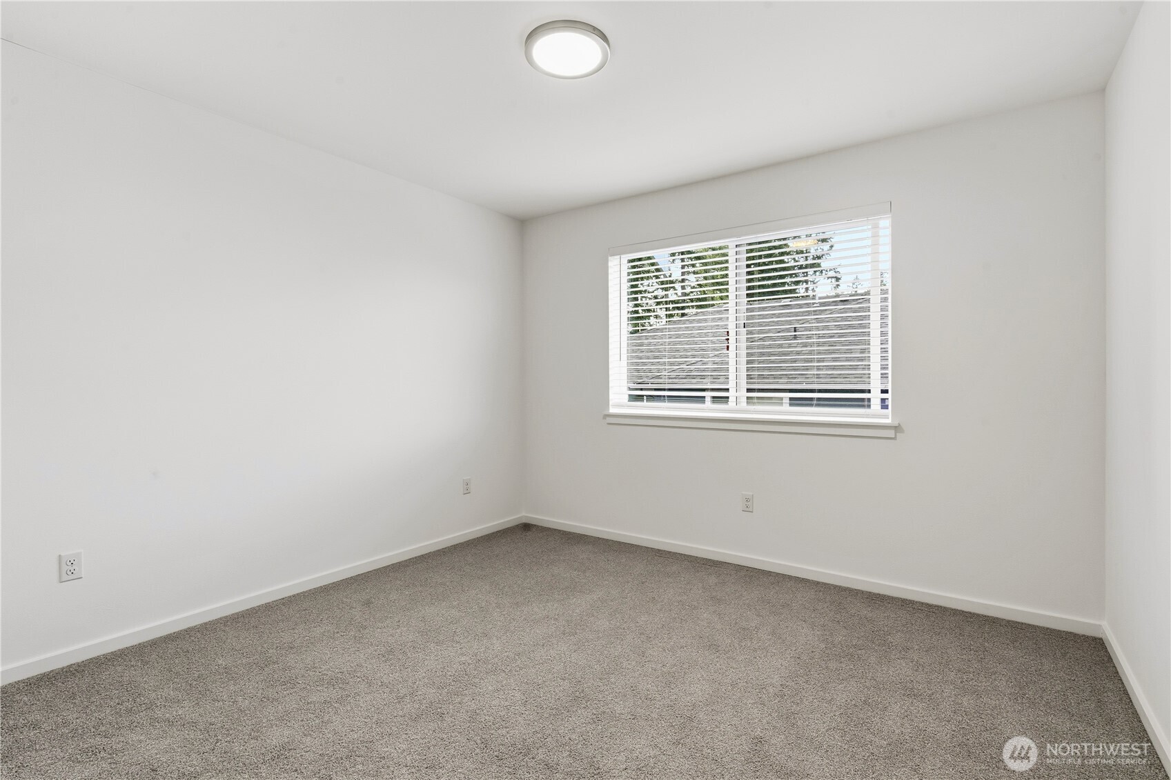 6563 Southeast 8th Street Renton, WA 98059 - Photo 33 of 40 an empty room with a window