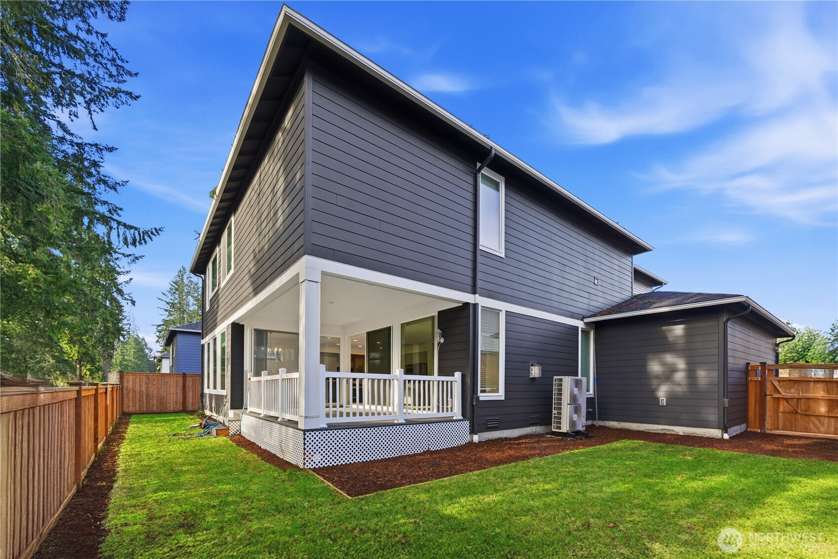 6563 Southeast 8th Street Renton, WA 98059 - Photo 40 of 40 a view of a house with a yard and sitting area