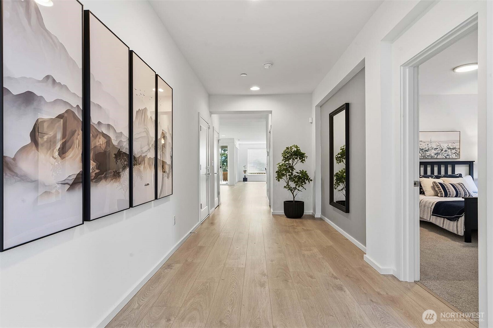 6563 Southeast 8th Street Renton, WA 98059 - Photo 4 of 40 a view of a hallway with living room
