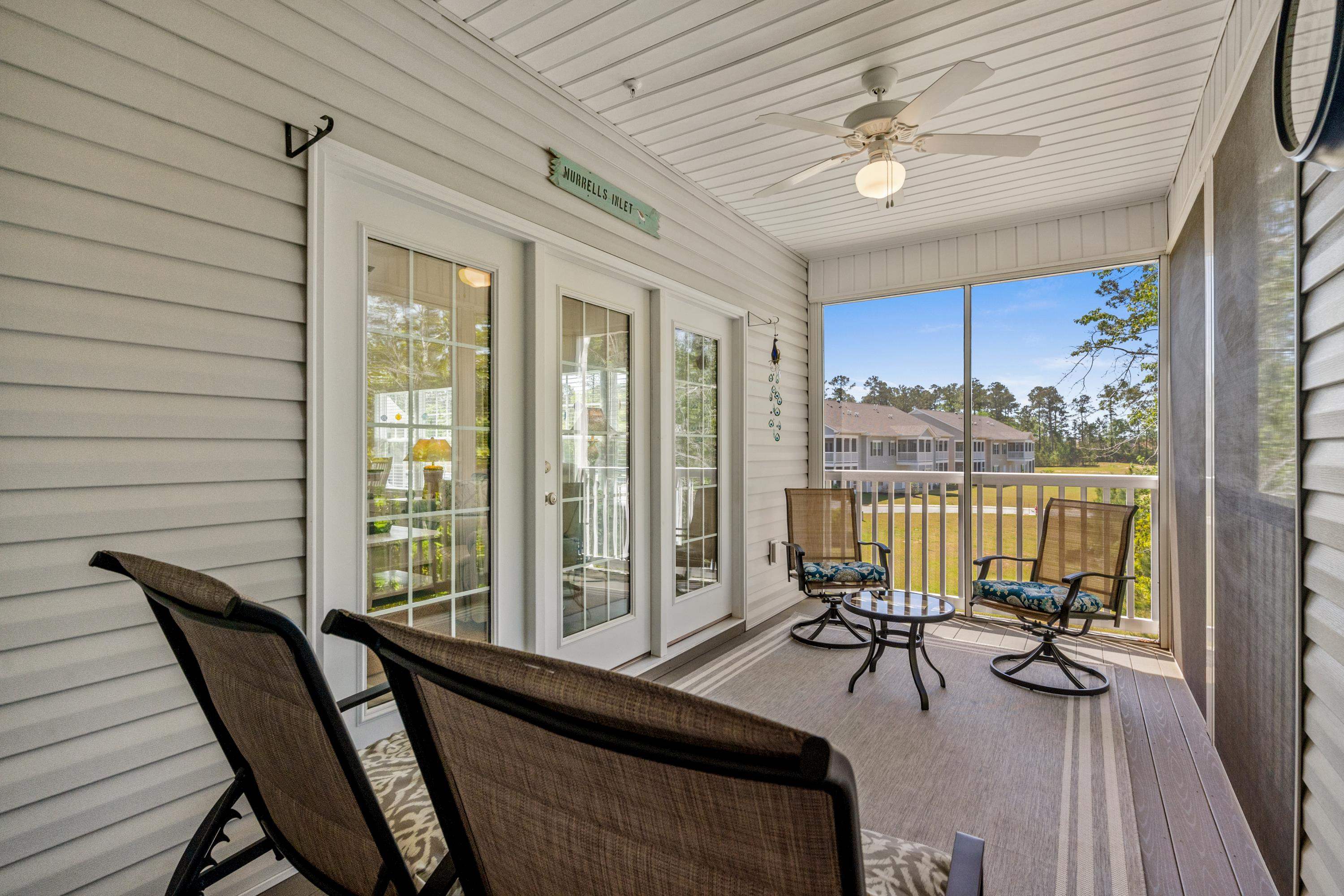 948 Jackline Place, Unit 201 Murrells Inlet, SC 29576 - Photo 20 of 37 Sunroom / solarium featuring a ceiling fan