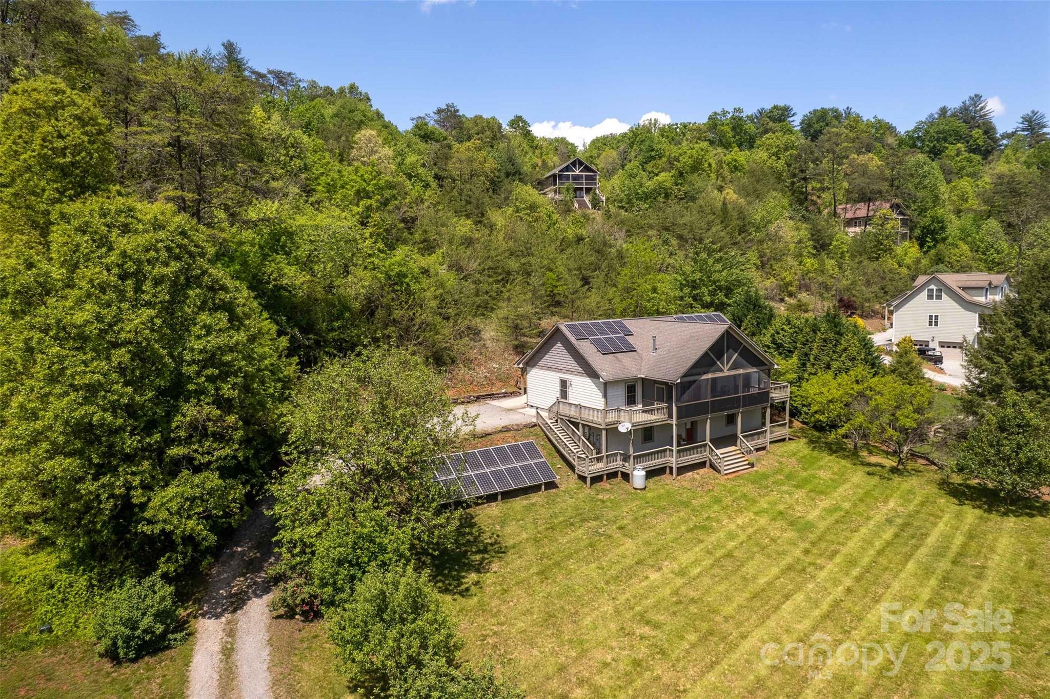 980 South River Road Sylva, NC 28779 - Photo 20 of 41 an aerial view of a house with swimming pool and garden view