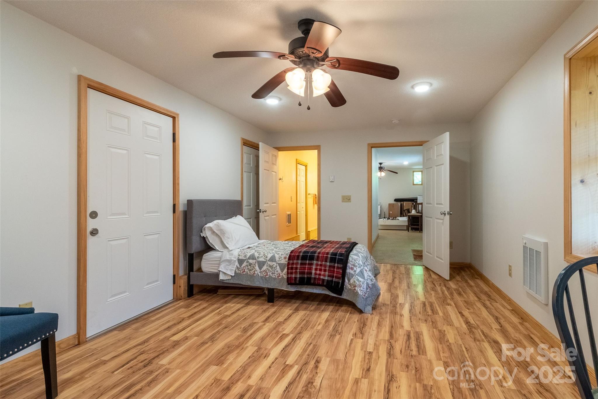 980 South River Road Sylva, NC 28779 - Photo 39 of 41 a living room with furniture and a wooden floor