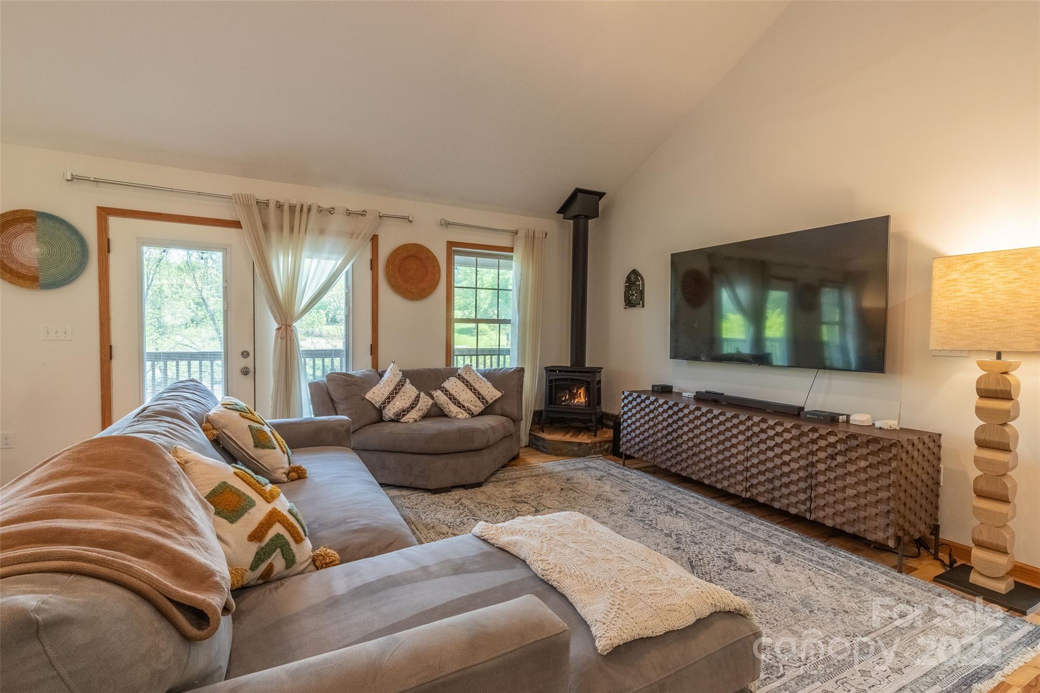 980 South River Road Sylva, NC 28779 - Photo 10 of 41 a living room with furniture and a flat screen tv