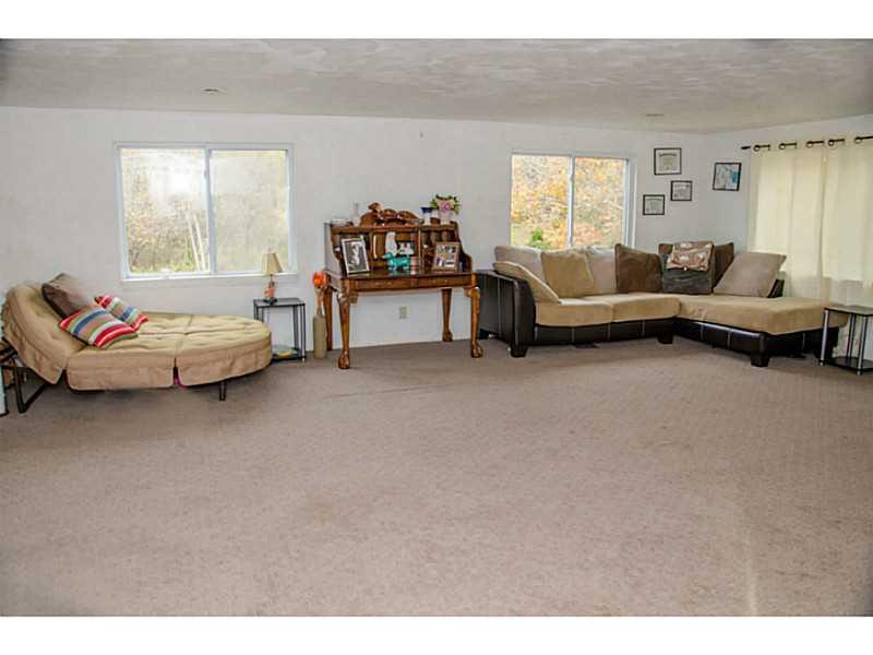 162 Truver Road Valencia, PA 16059 - Photo 10 of 17 Family Room. Extra large entertaining space