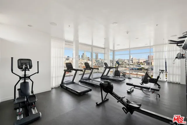 a view of a chairs and table in the patio