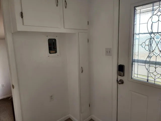 a close view of kitchen with window