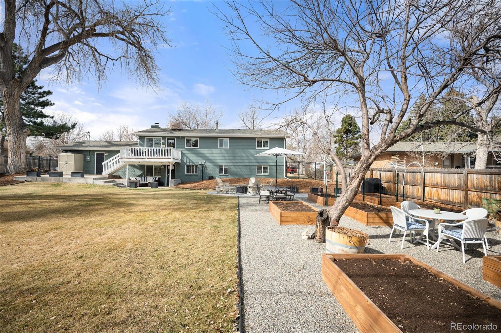 4 Skyline Drive Wheat Ridge, CO 80215 - Photo 16 of 41 a view of a swimming pool with a patio