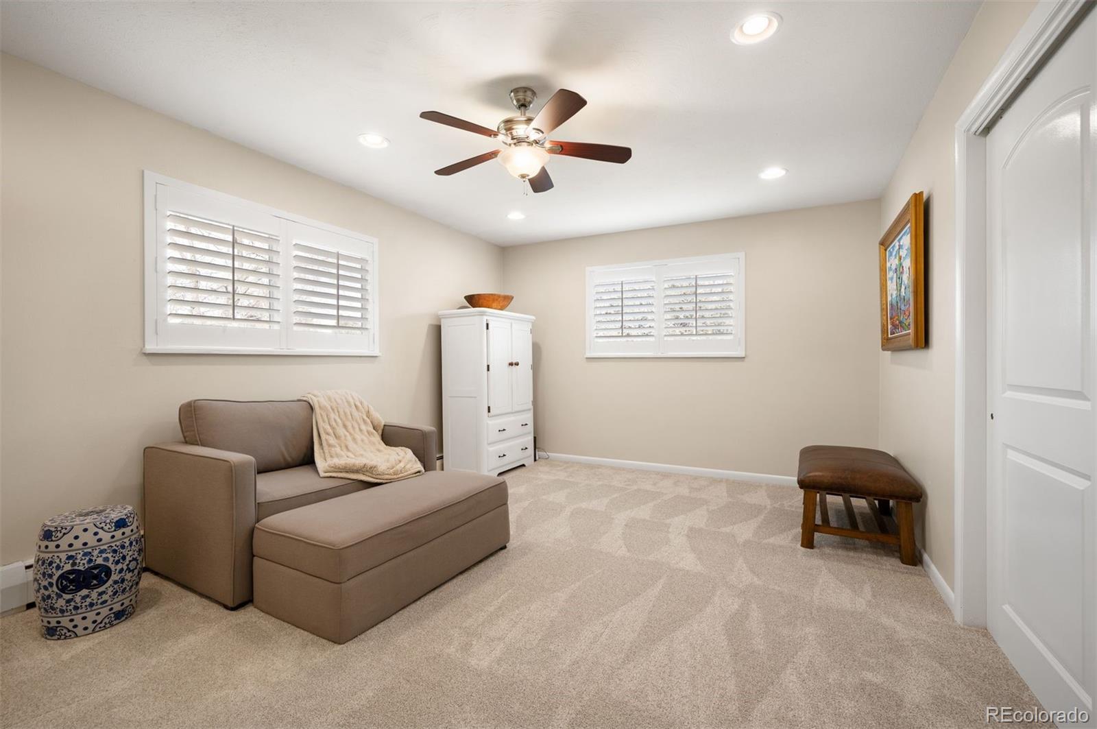 4 Skyline Drive Wheat Ridge, CO 80215 - Photo 20 of 41 a living room with furniture and a window