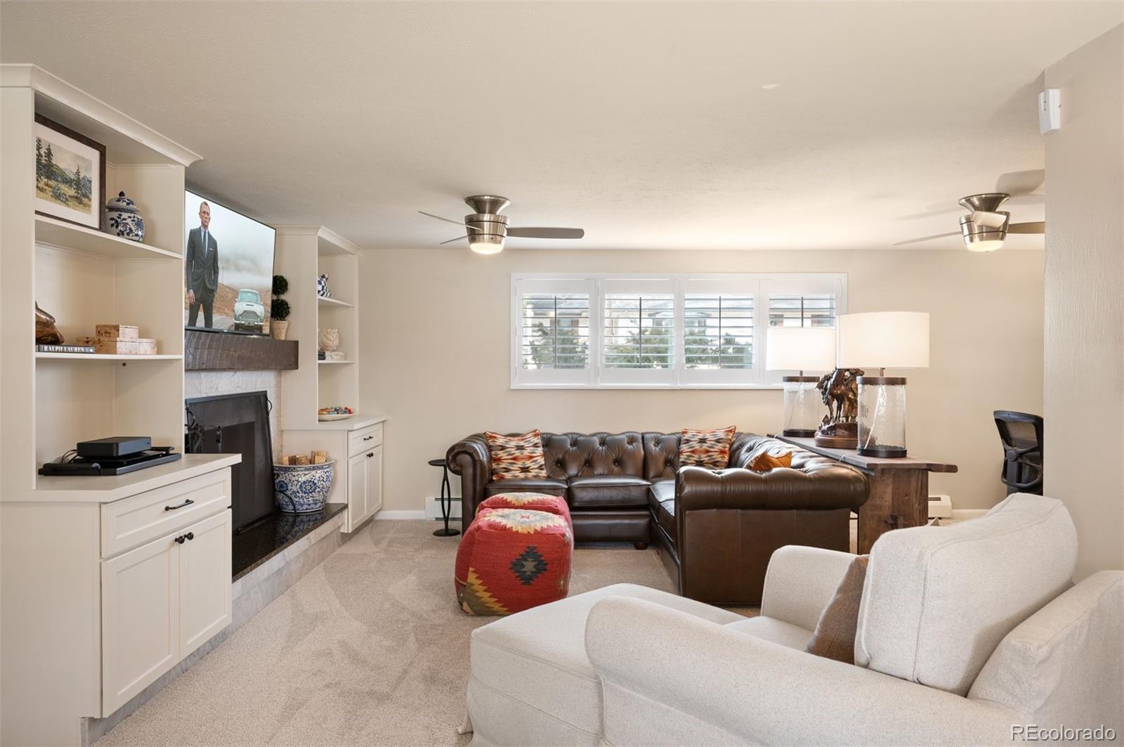 4 Skyline Drive Wheat Ridge, CO 80215 - Photo 23 of 41 a living room with furniture and a window