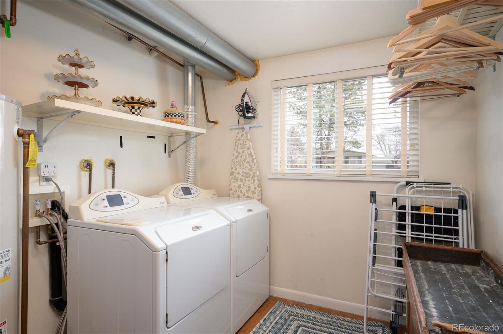 4 Skyline Drive Wheat Ridge, CO 80215 - Photo 27 of 41 a utility room with dryer and washer