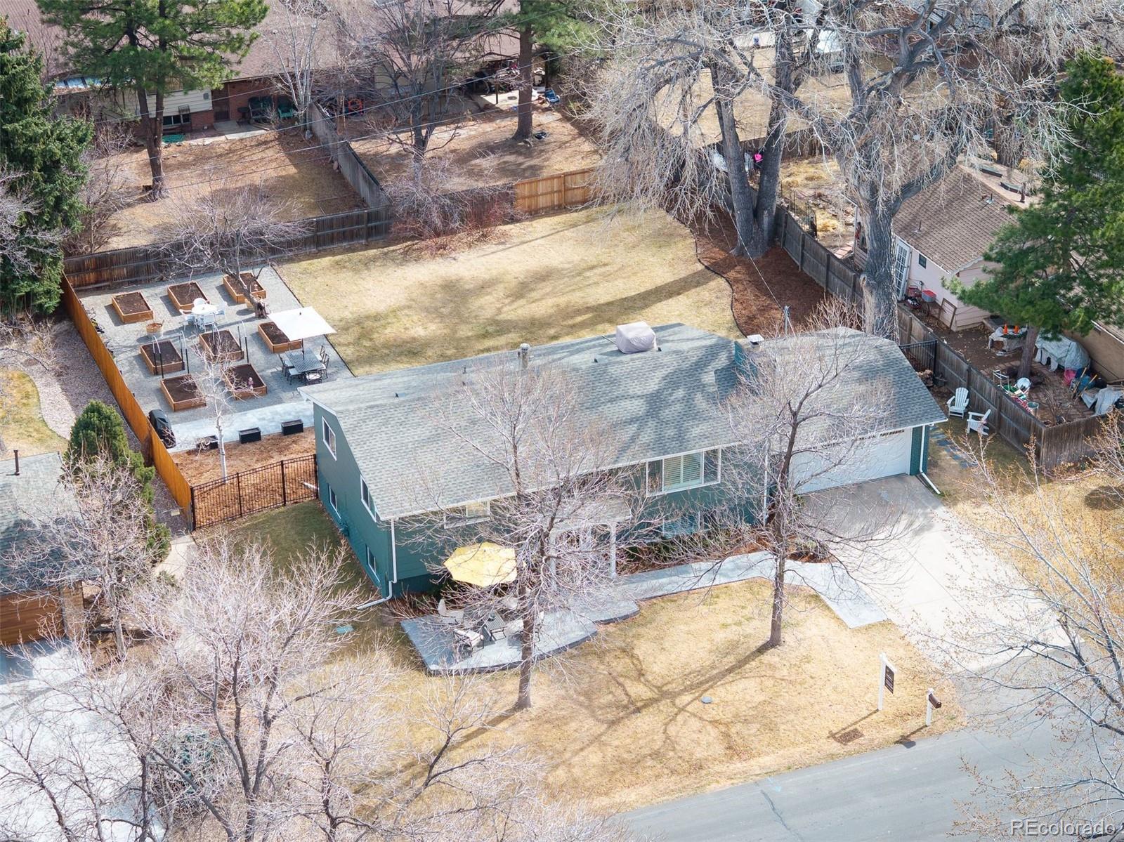 4 Skyline Drive Wheat Ridge, CO 80215 - Photo 35 of 41 a view of a backyard with wooden fence