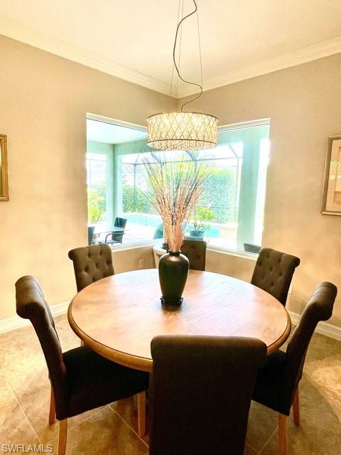14726 Nautilus Place Naples, FL 34114 - Photo 13 of 21 a view of a dining room with furniture and window