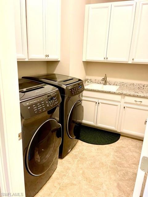 14726 Nautilus Place Naples, FL 34114 - Photo 14 of 21 a utility room with dryer and washer