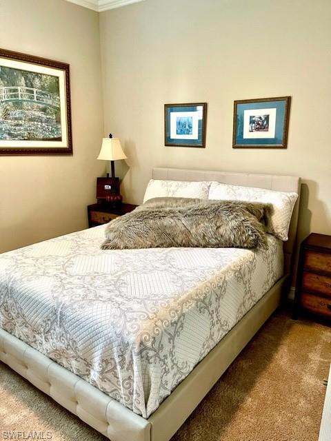 14726 Nautilus Place Naples, FL 34114 - Photo 15 of 21 a bedroom with bed and wall painting