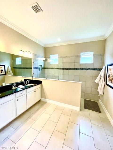 14726 Nautilus Place Naples, FL 34114 - Photo 19 of 21 a large white kitchen with stainless steel appliances a sink and a counter top space