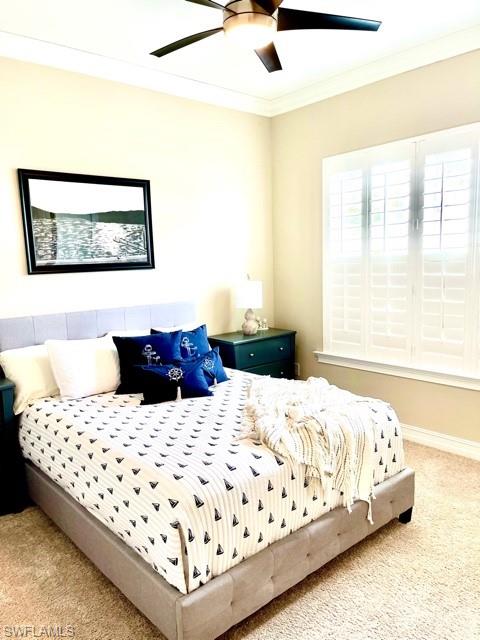 14726 Nautilus Place Naples, FL 34114 - Photo 2 of 21 a bedroom with a bed and wooden floor