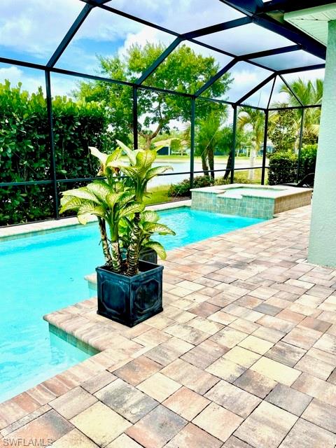 14726 Nautilus Place Naples, FL 34114 - Photo 4 of 21 a view of a garden with an umbrella