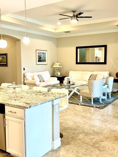 14726 Nautilus Place Naples, FL 34114 - Photo 7 of 21 a bathroom with a granite countertop sink and a mirror