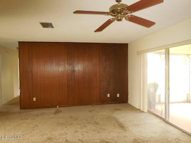 1108 Madrid Road Rockledge, FL 32955 - Photo 3 of 13 Living/Dining Room