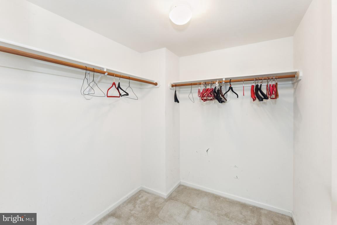 1712 W Street Southeast, Unit 18 Washington, DC 20020 - Photo 11 of 20 a view of walk in closet with clothes