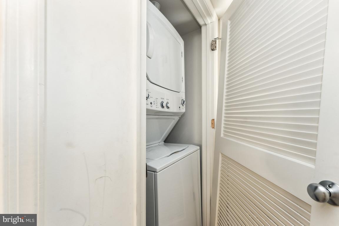 1712 W Street Southeast, Unit 18 Washington, DC 20020 - Photo 13 of 20 a room with a washer and dryer
