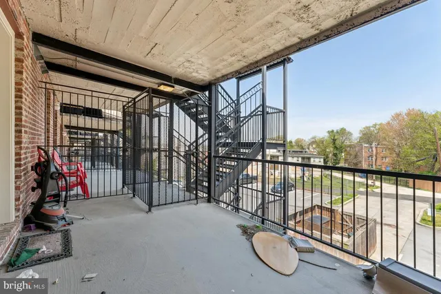 a view of a building with a yard