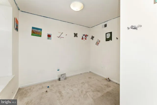 a view of a hallway with closet