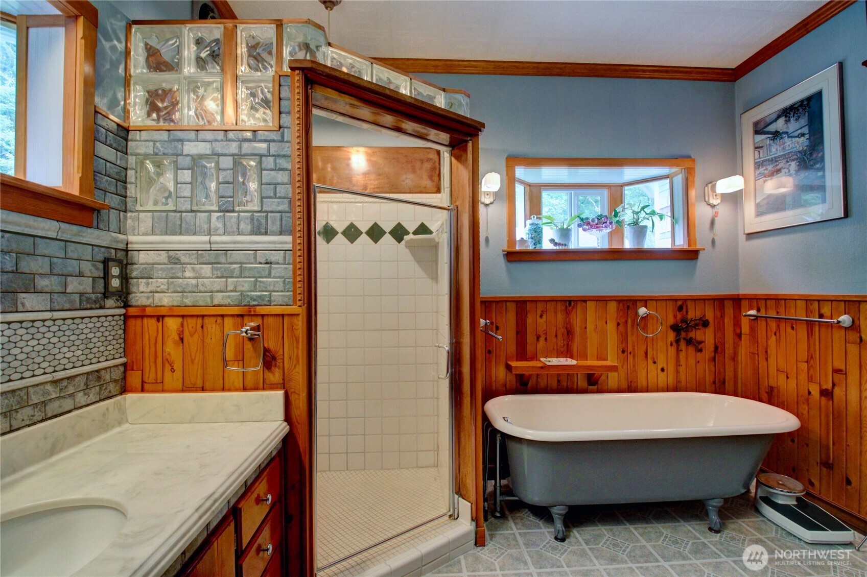 2909 Overpass Road Bow, WA 98232 - Photo 16 of 40 a bathroom with a sink a mirror and a toilet