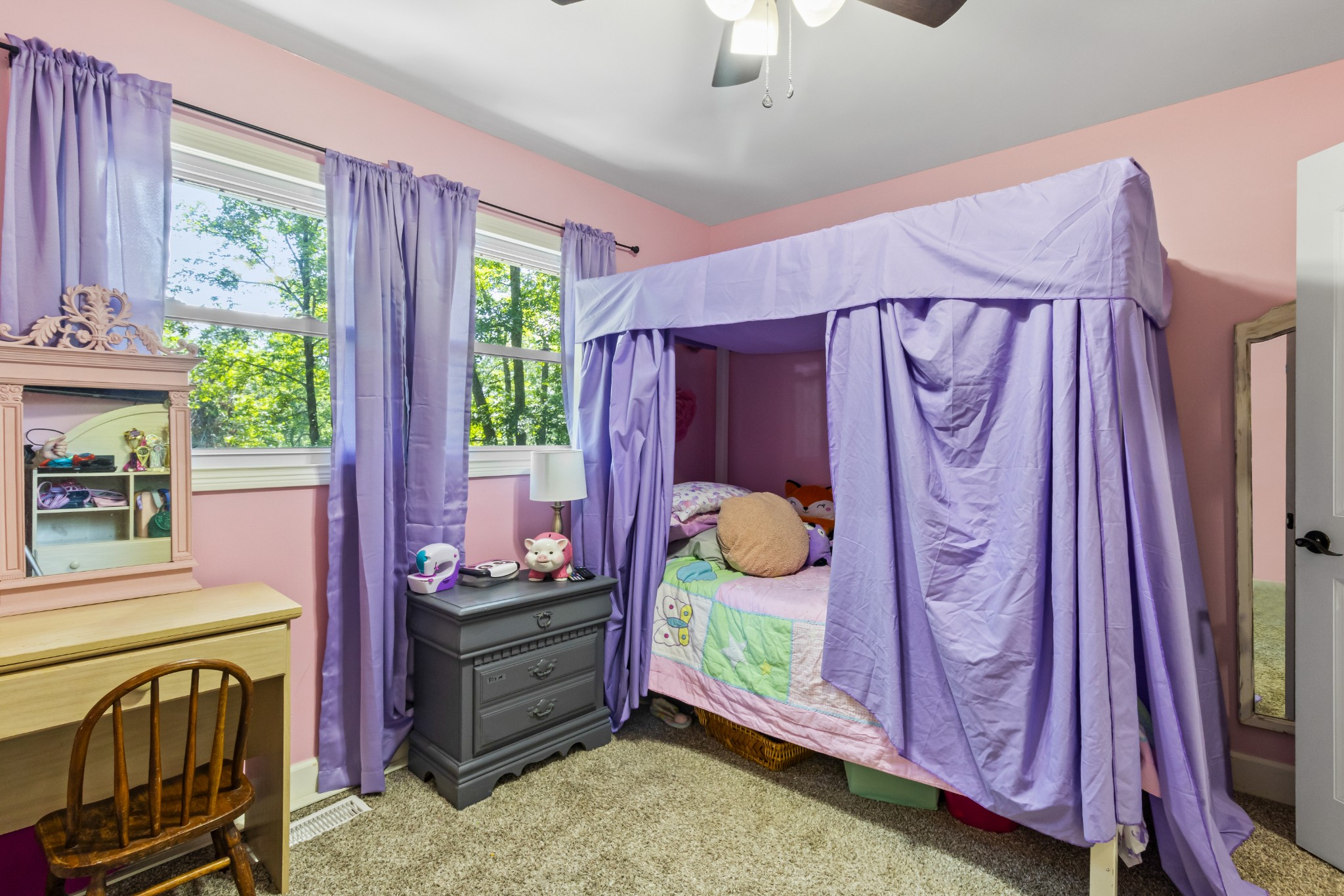 408 Sandy Road Dover, TN 37058 - Photo 17 of 36 a bed room with a bed and a window