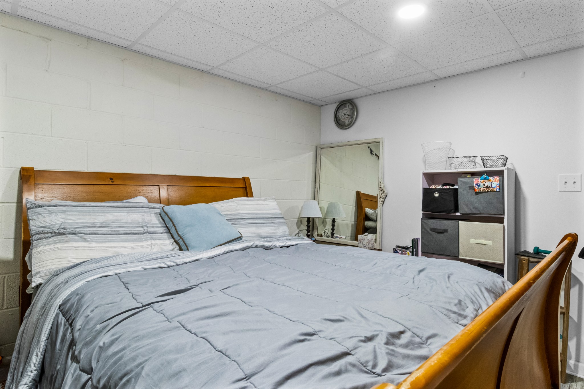 408 Sandy Road Dover, TN 37058 - Photo 19 of 36 a bedroom with a bed and a flat screen tv