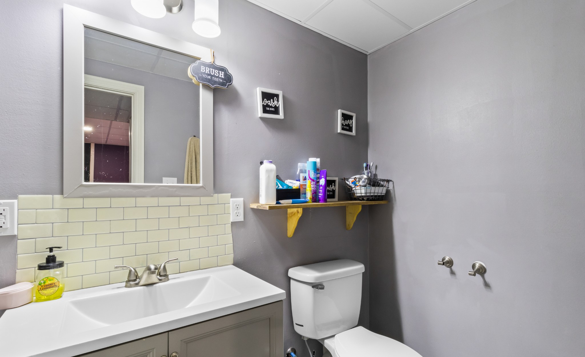 408 Sandy Road Dover, TN 37058 - Photo 26 of 36 a bathroom with a sink mirror and toilet