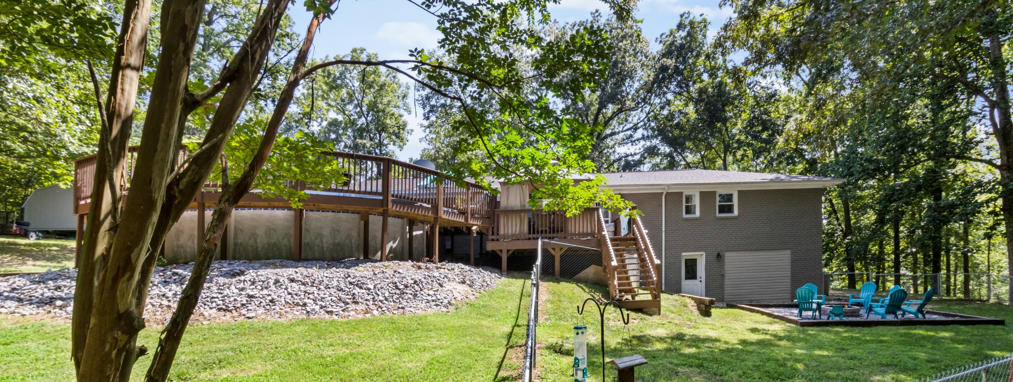 408 Sandy Road Dover, TN 37058 - Photo 36 of 36 a view of a backyard with a garden