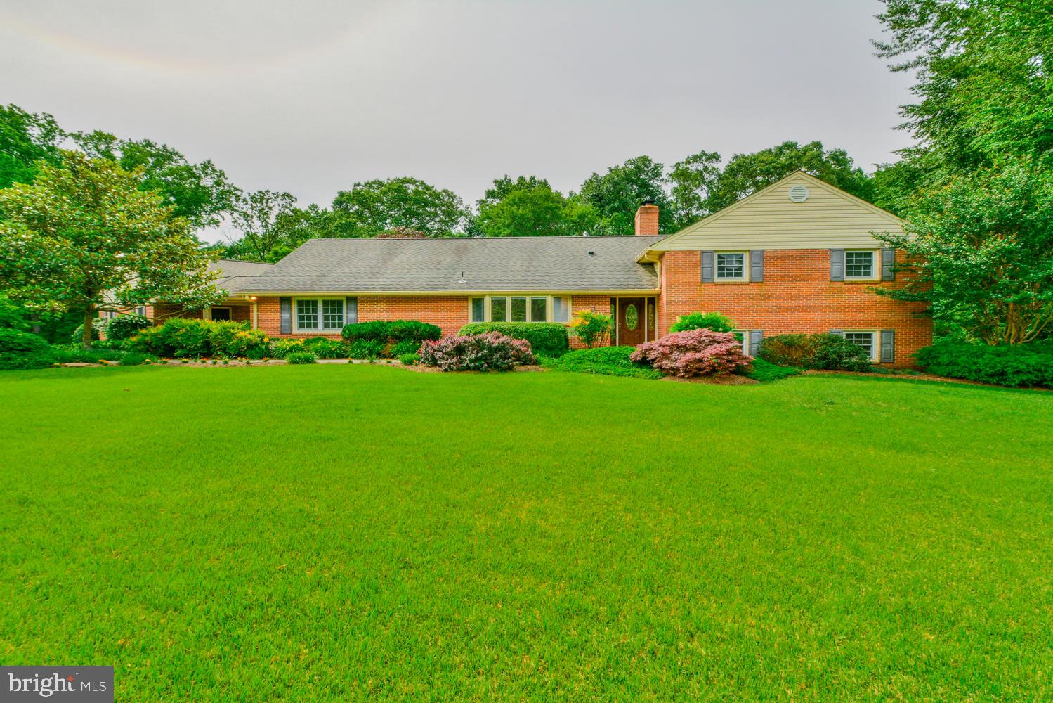 Renovated 4 level split on 1 acre corner lot