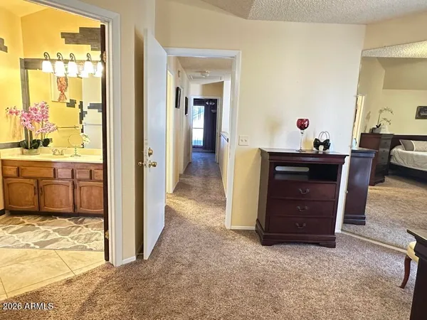 a view of a cabinet and a mirror
