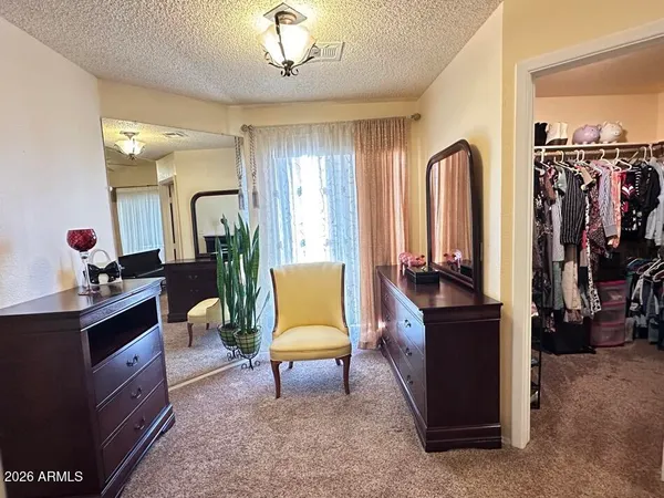 a view of a workspace with furniture and a livingroom