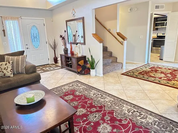 a bedroom with furniture and a fireplace