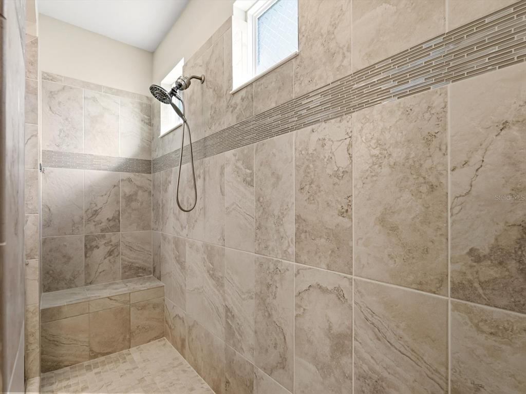 17422 Channel Way Winter Garden, FL 34787 - Photo 21 of 44 a bathroom with a shower