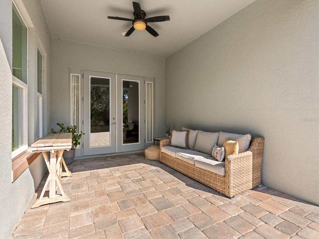 17422 Channel Way Winter Garden, FL 34787 - Photo 34 of 44 a living room with furniture and a rug