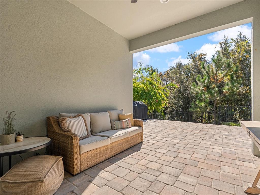 17422 Channel Way Winter Garden, FL 34787 - Photo 35 of 44 a living room with furniture and a large window