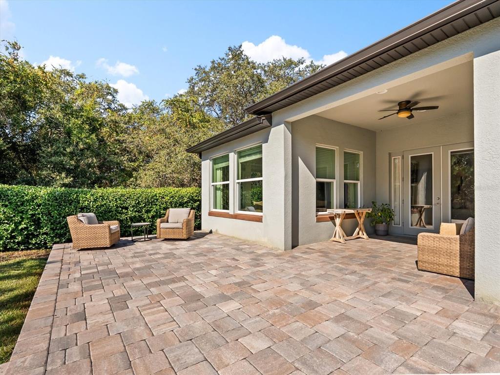 17422 Channel Way Winter Garden, FL 34787 - Photo 36 of 44 a view of a house with backyard sitting area and garden