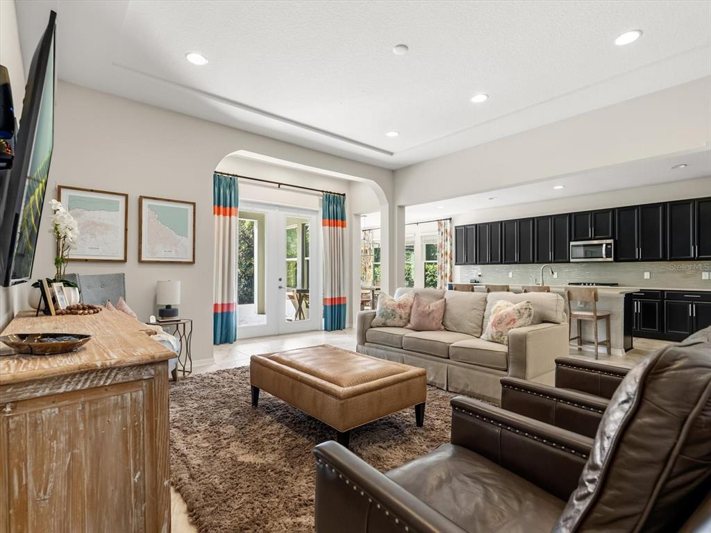 17422 Channel Way Winter Garden, FL 34787 - Photo 4 of 44 a living room with furniture and a table