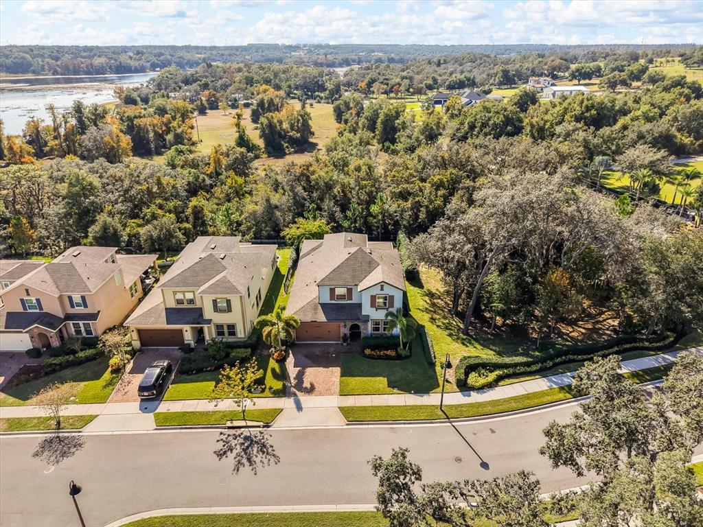 17422 Channel Way Winter Garden, FL 34787 - Photo 41 of 44 an aerial view of a house with a swimming pool yard and outdoor seating