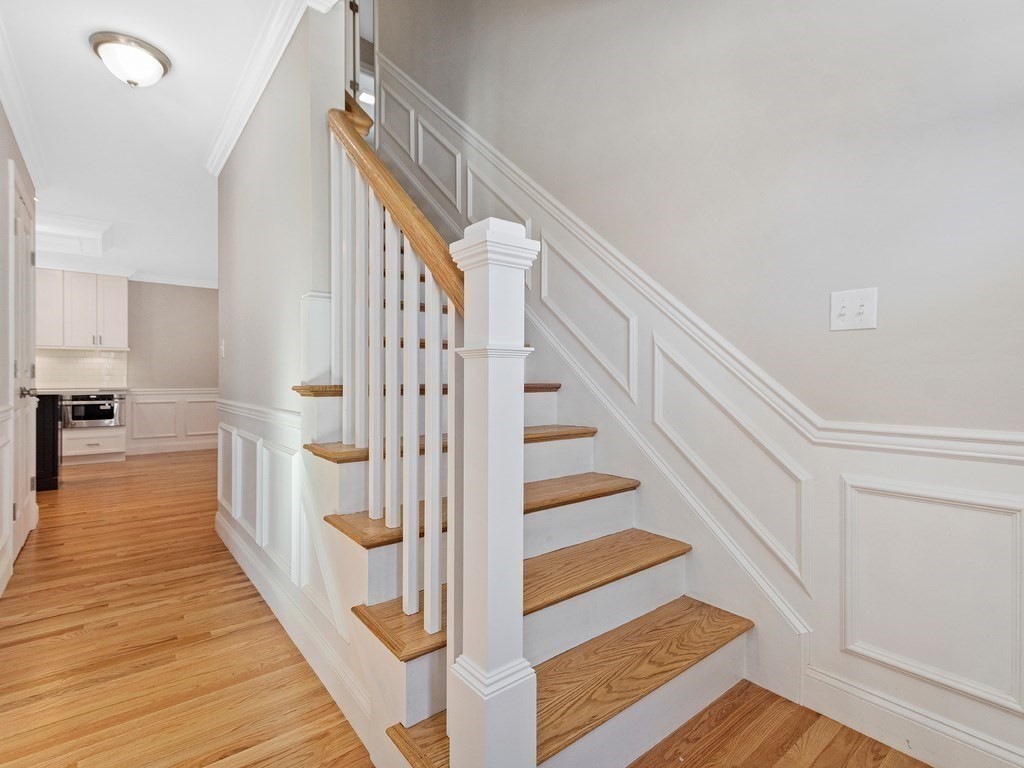 33 Circle Drive Waltham, MA 02452 - Photo 15 of 38 a view of entryway and hall with wooden floor