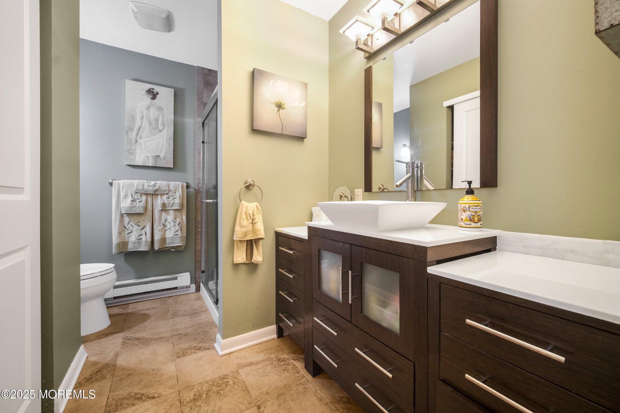 17 B Drake Street Whiting, NJ 08759 - Photo 14 of 18 a bathroom with a sink vanity and mirror