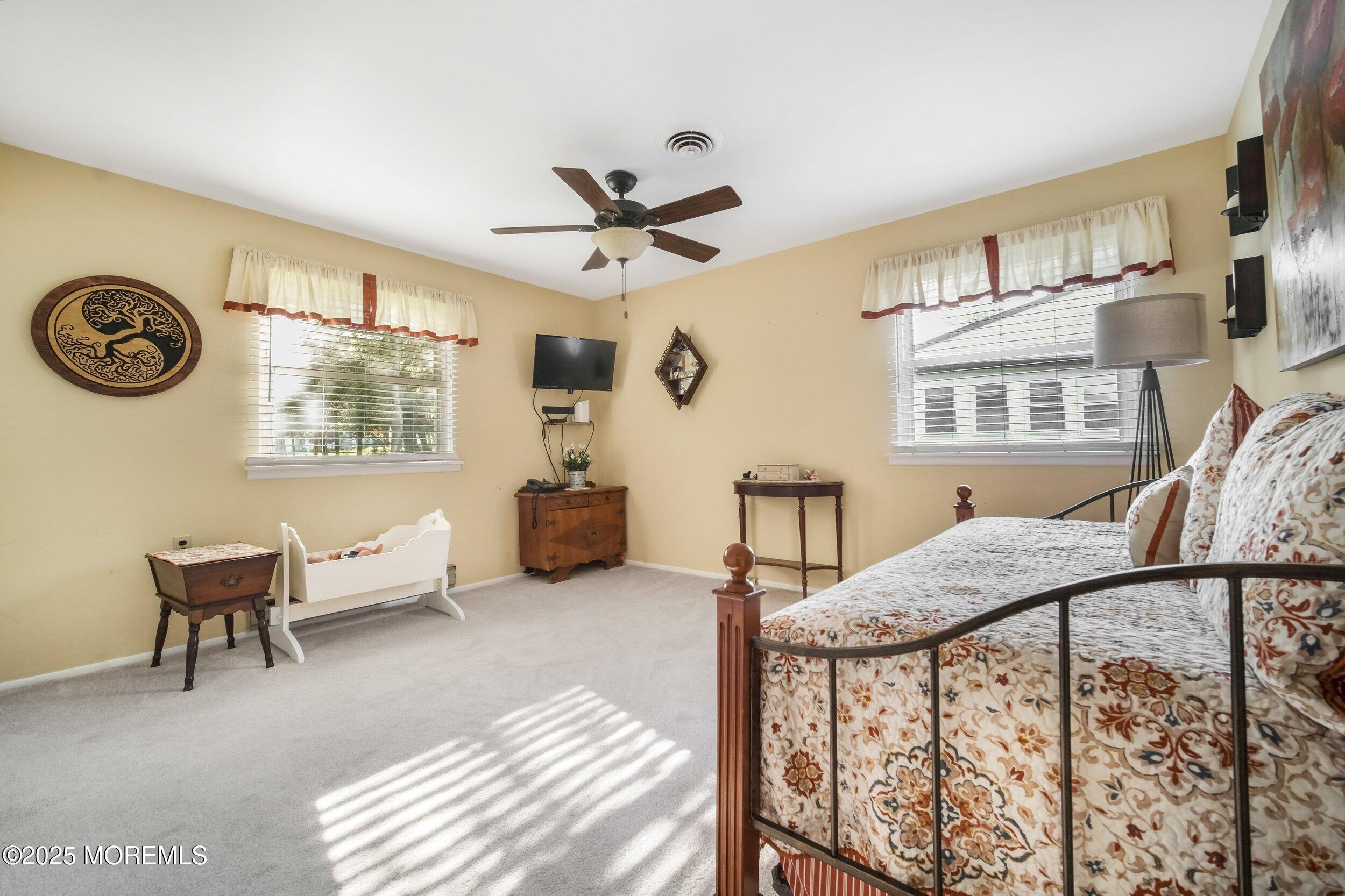 17 B Drake Street Whiting, NJ 08759 - Photo 16 of 18 a bedroom with furniture and a window