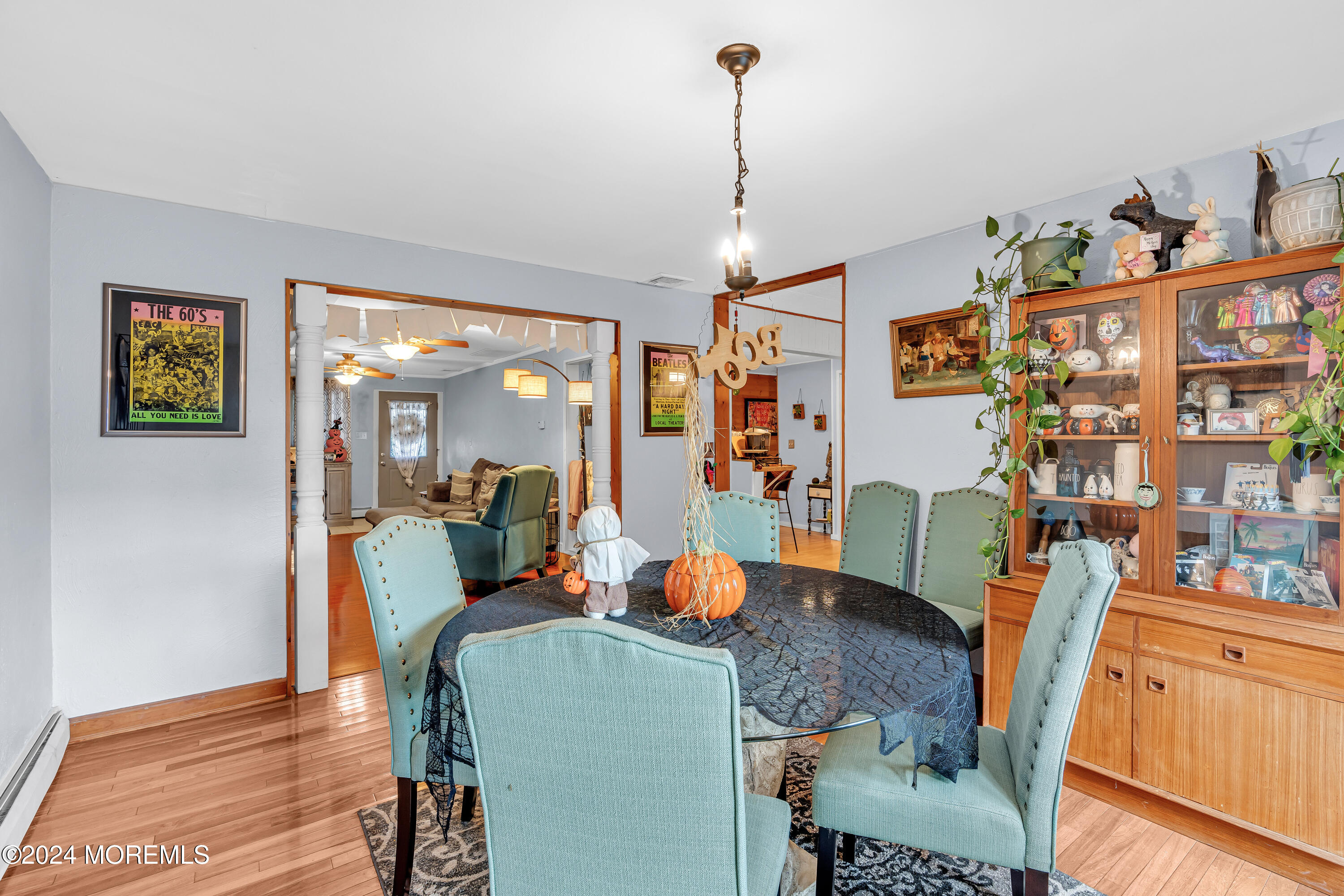 13 Hemlock Road Howell, NJ 07731 - Photo 13 of 48 a dining room with furniture and wooden floor